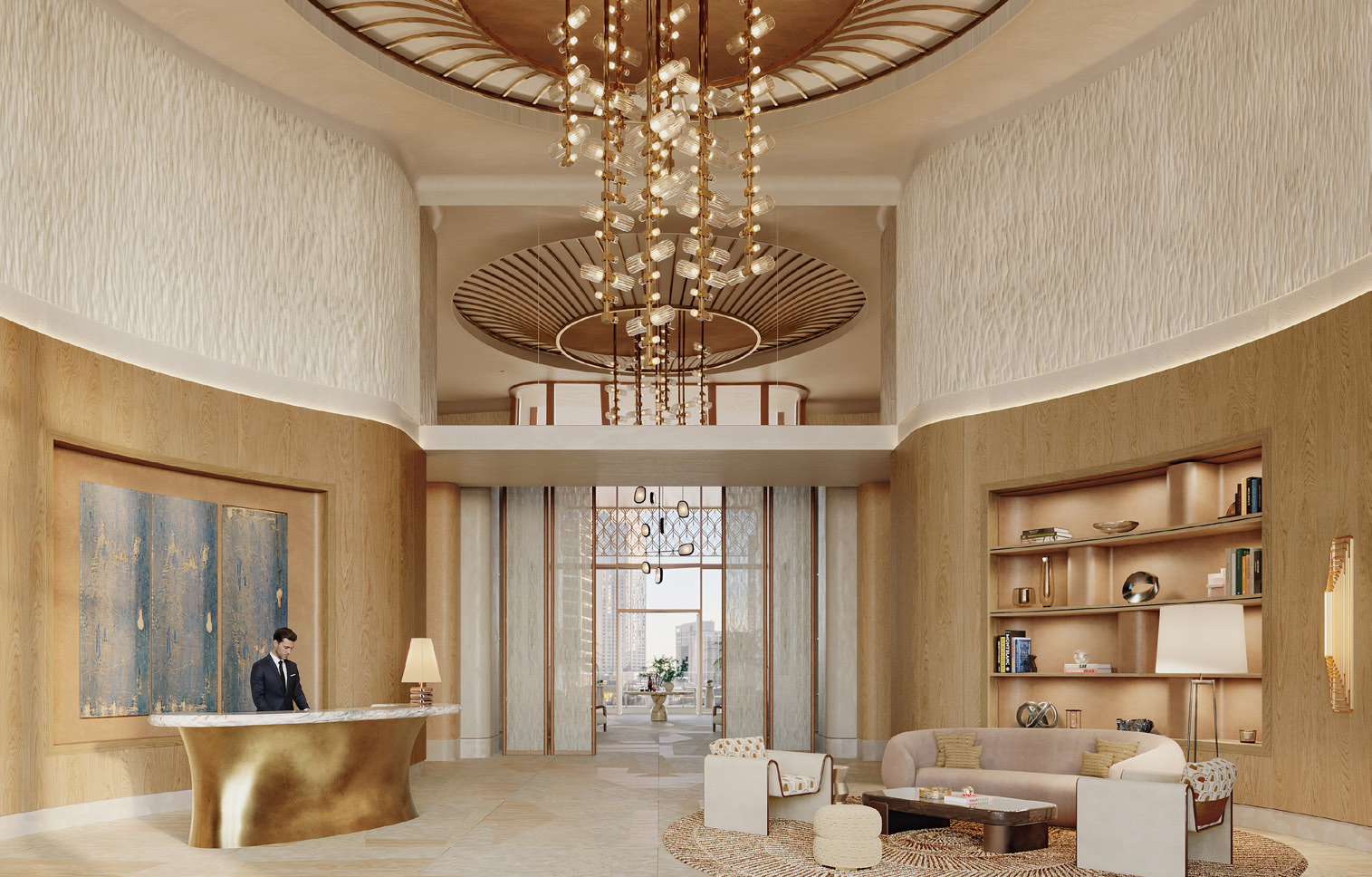 Double-height lobby with sculptural chandelier, concierge desk and lounge seating