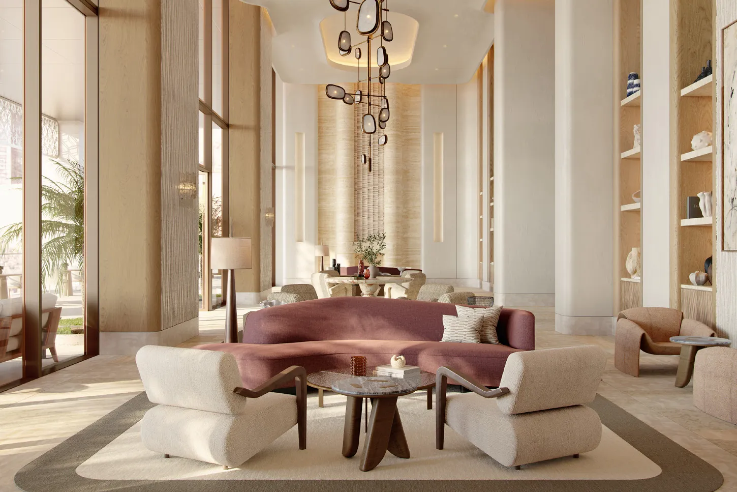Residents' lounge with curved sofa, armchairs and tall windows