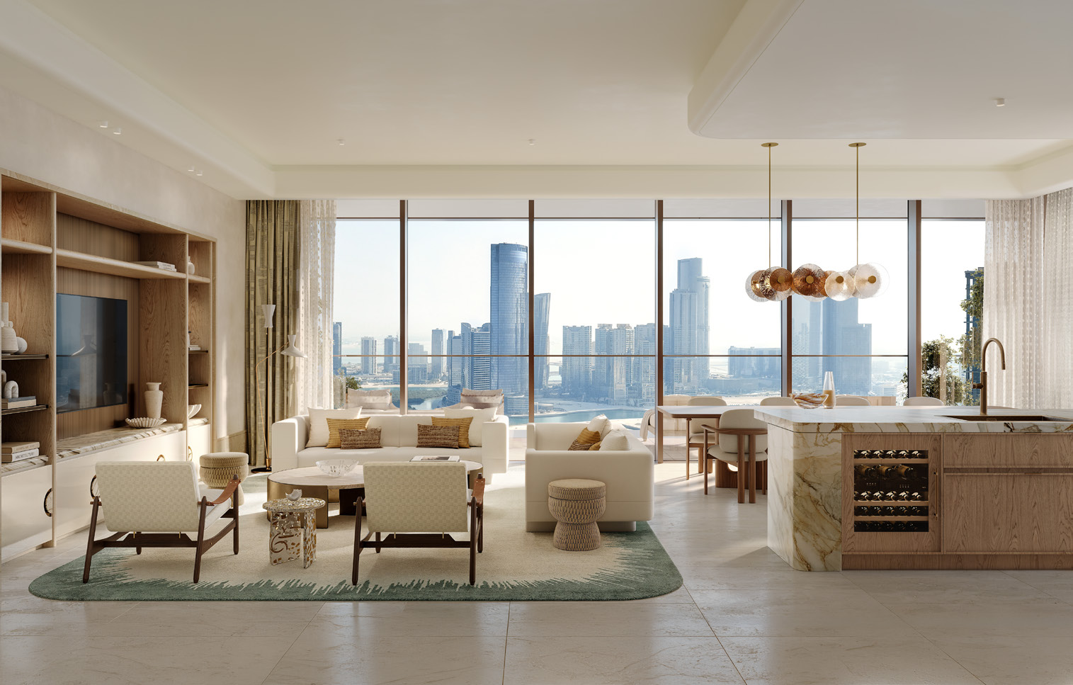 Open kitchen with marble island beside dining and living areas
