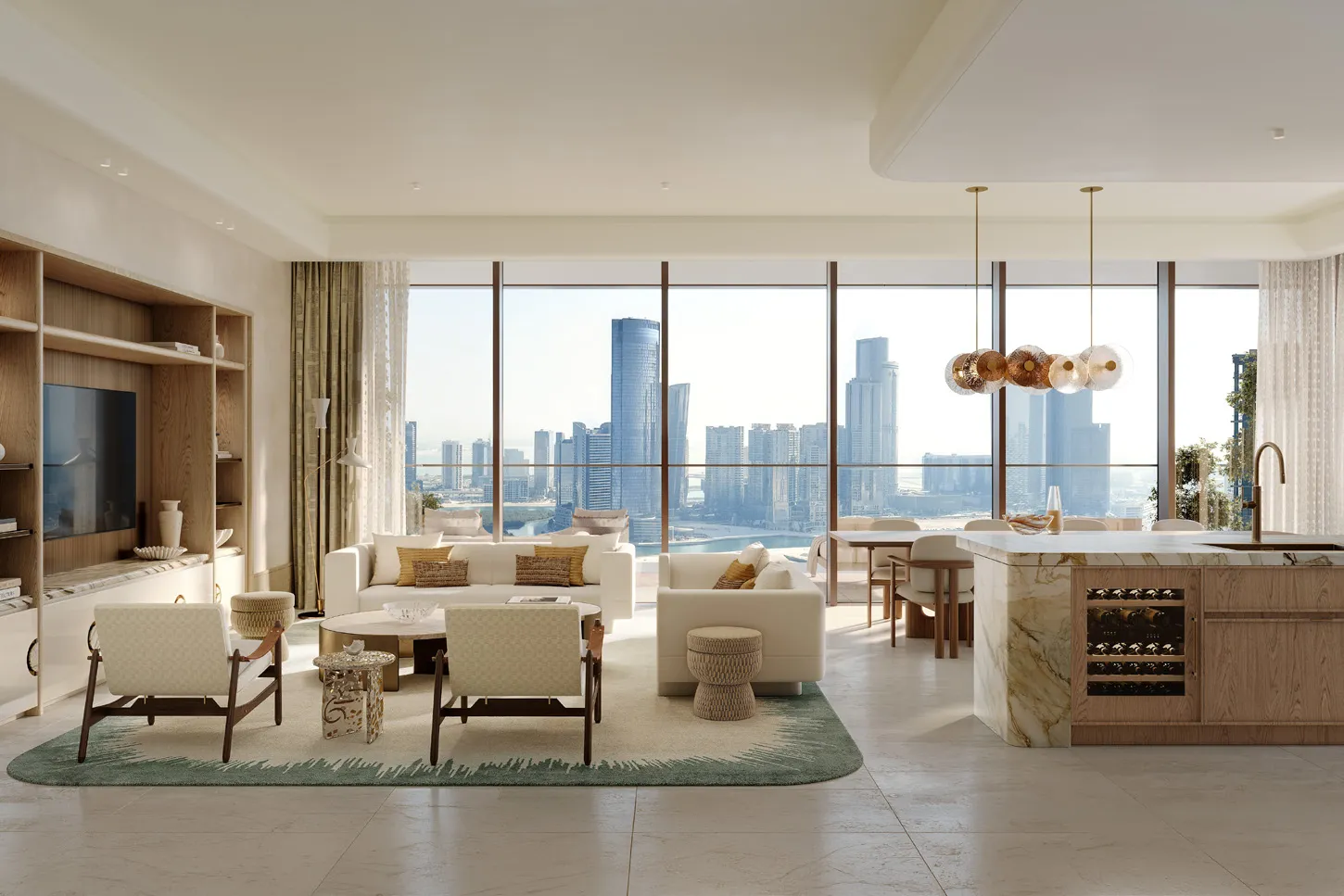 Open kitchen with marble island beside dining and living areas