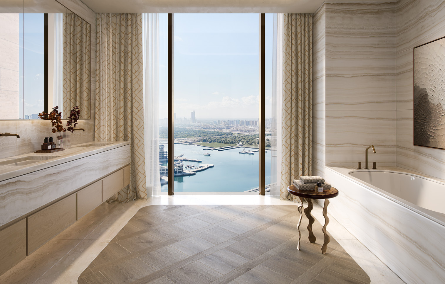 Marble bathroom with freestanding tub and tall window over the marina